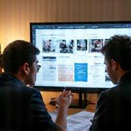 Clients reviewing design mockups